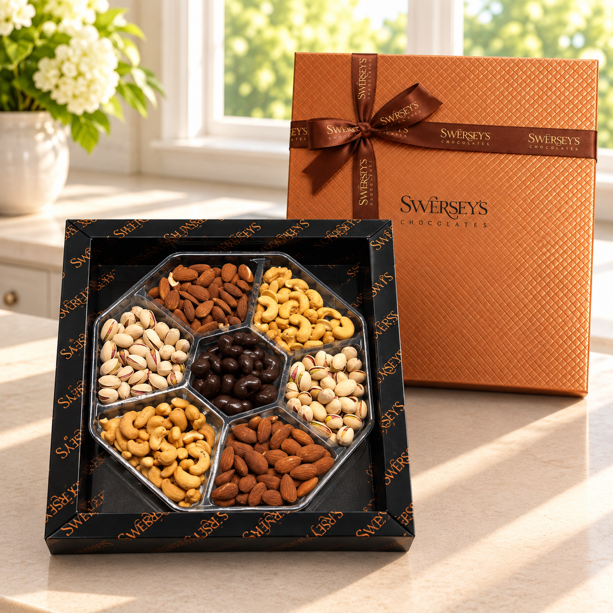 Kosherline premium assorted nuts gift box with cashews, almonds, walnuts, pistachios, and chocolate-covered almonds.