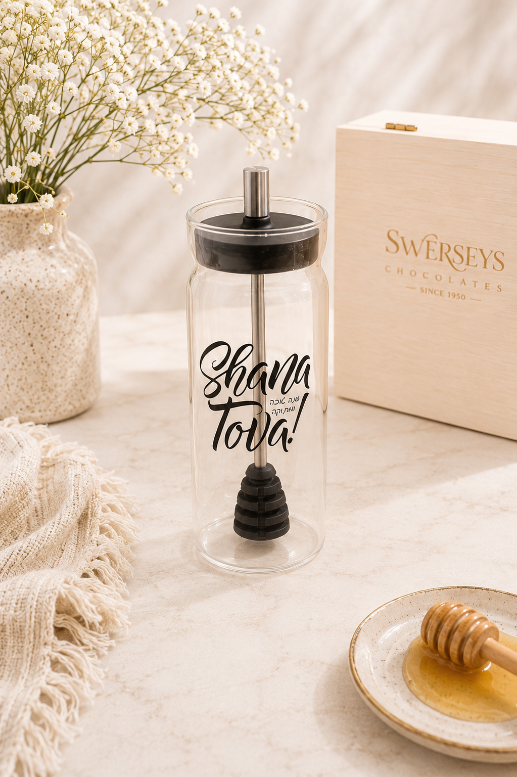 Kosherline modern glass honey dish with black lid and Shana Tova lettering, including a matching keepsake box.