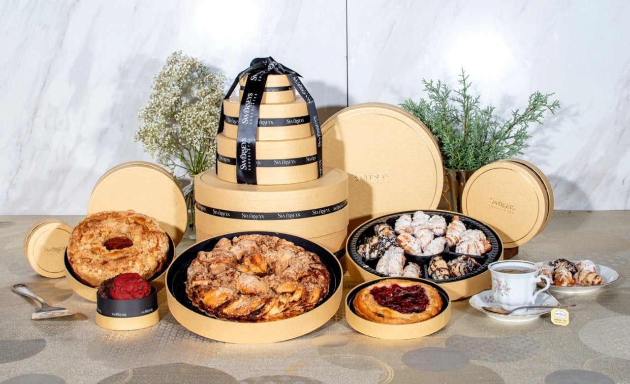 Kosherline Deluxe Gold 5 Tier Gourmet Bakery Gift Box featuring assorted rugelach, babka, bundt cake, and fruit pies.
