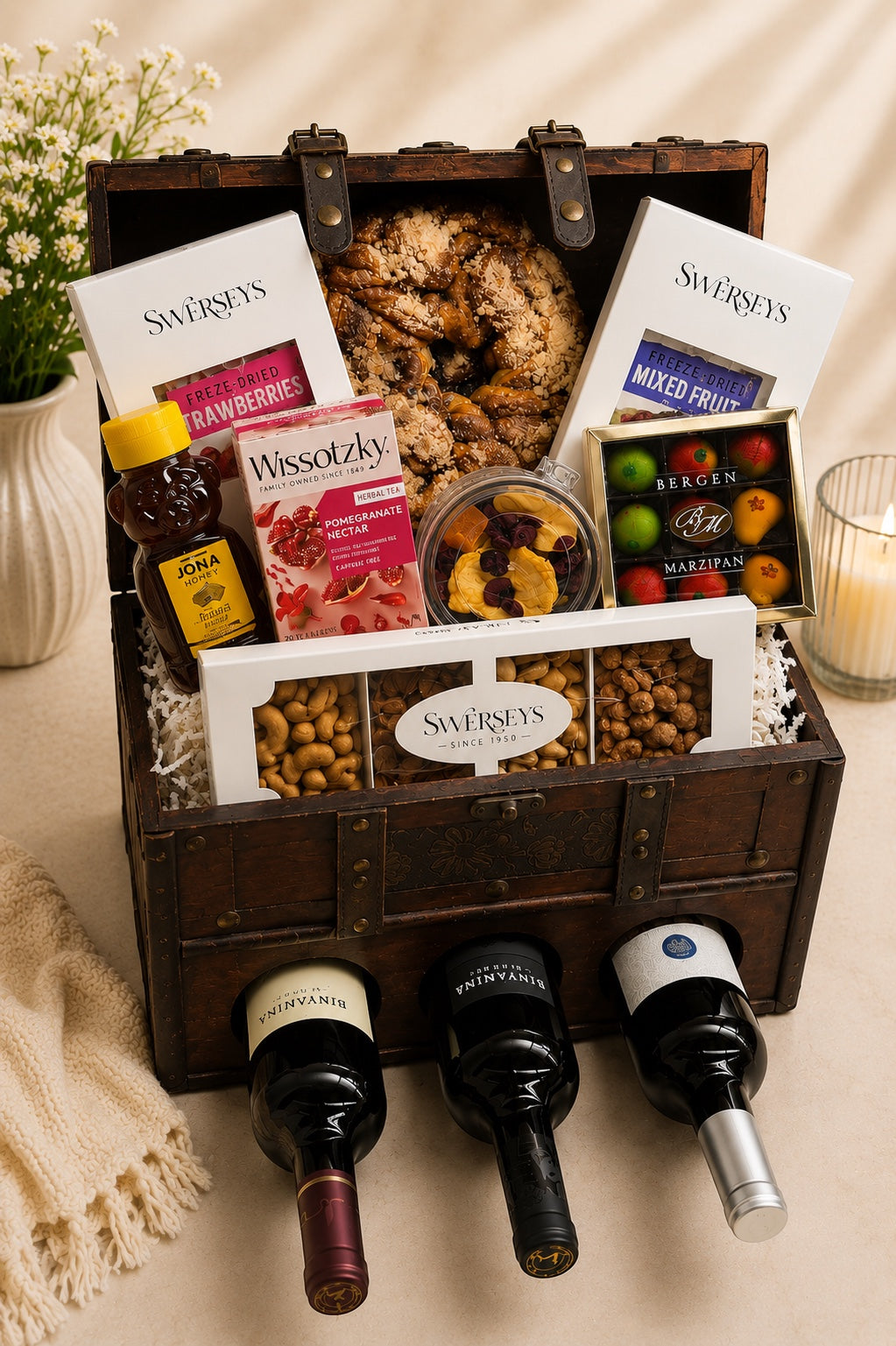 Kosherline Grand Reserve wooden wine and gourmet gift chest filled with Swersey's treats, honey, and wine bottles.