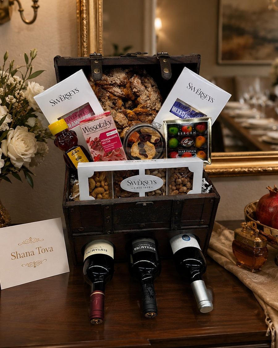 Kosherline Grand Reserve wooden wine and gourmet gift chest with three wine bottles, artisanal snacks, and Shana Tova card
