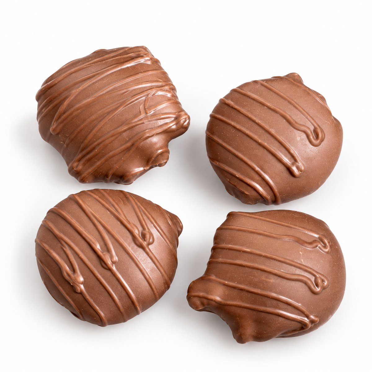Kosherline gourmet milk chocolate clusters with decorative drizzle, perfect for a premium kosher gift tower.