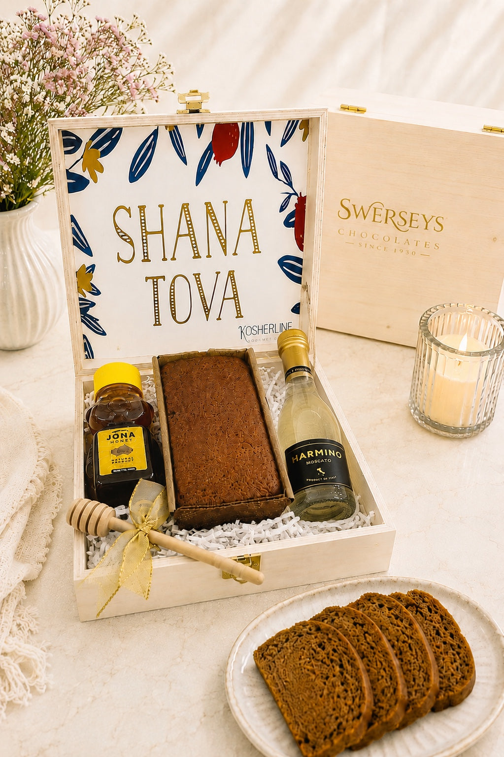 Kosherline Rosh Hashanah gift set in a wooden box with honey cake, sparkling wine, honey bear, and wooden dipper.