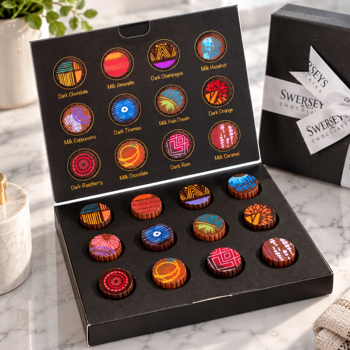 Kosherline Swerseys artistic truffle gift box with twelve assorted handcrafted chocolates in a black display box