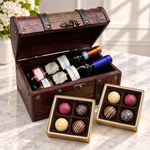 Kosherline wine chest containing two bottles of Bartenura wine with two boxes of assorted gourmet chocolate truffles
